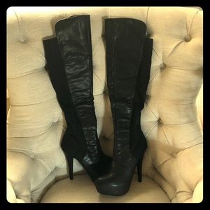 Over the knee fitted black boots